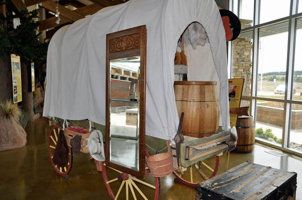 covered wagon Inside the Wyoming Welcome Center
